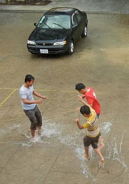 Boys planing in water